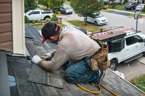 Professional Roof Replacement technician working in Needles, CA